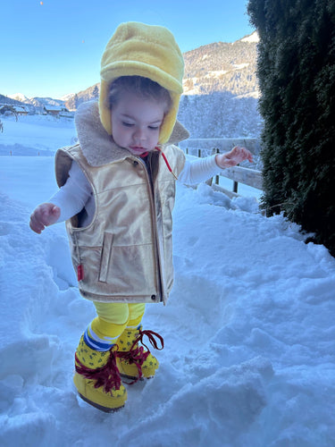 Winter Adventures in Megève: Rocking Her Leather Vest in the Snow